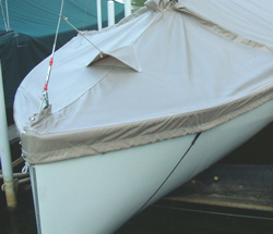 Tie down boat cover